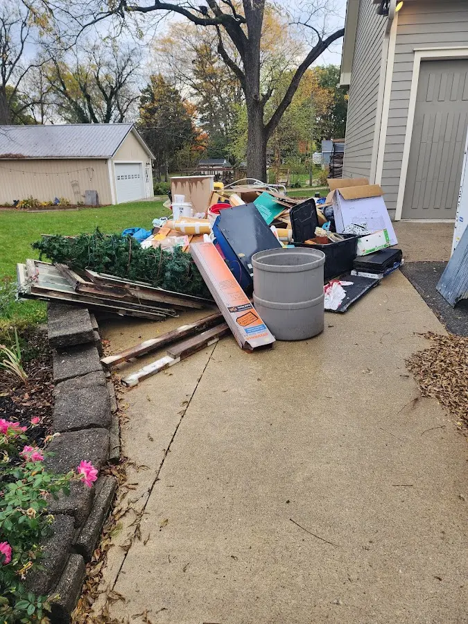 Dumpster being loaded with debris for 30 Yard Dumpster Rental in Bell Gardens